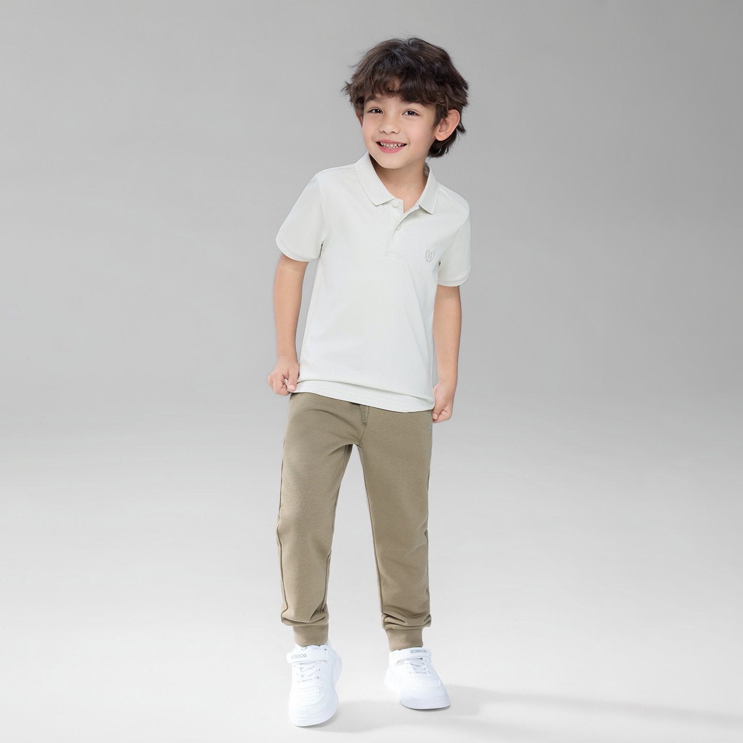 Junior's Slim Fit Liquid Touch Cotton Polo - Image 1