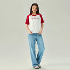 Women's Comfort Fit Raglan Sleeve Smurfs Print Crew Neck Tee - Image 1